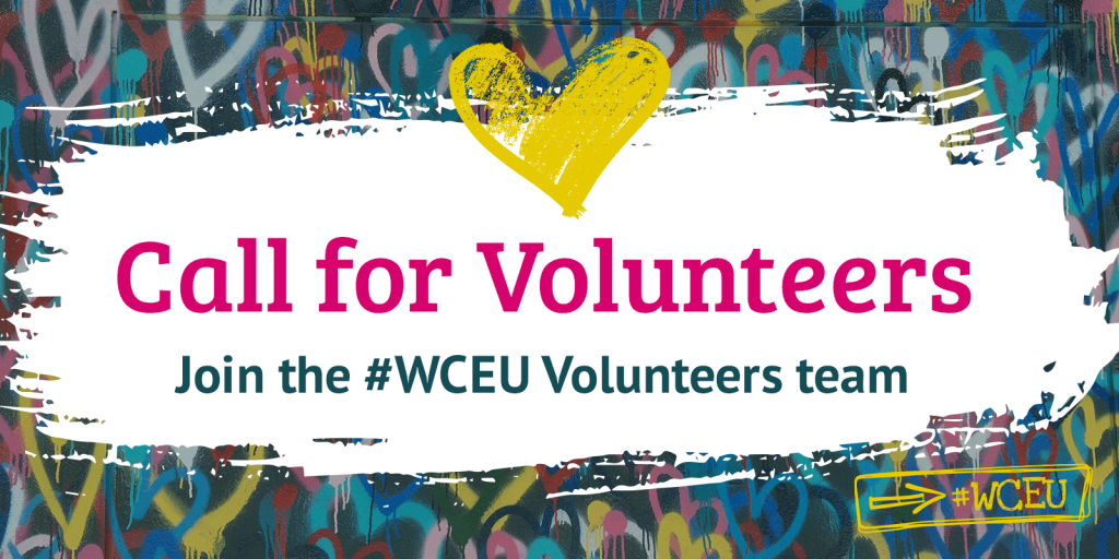 Text “Call for volunteers - Join the WCEU Volunteers Team” on a background of street art